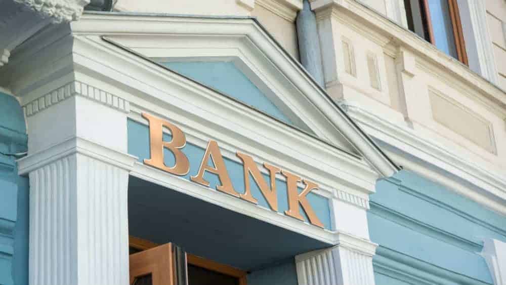 Bank sign on traditional europe building facade