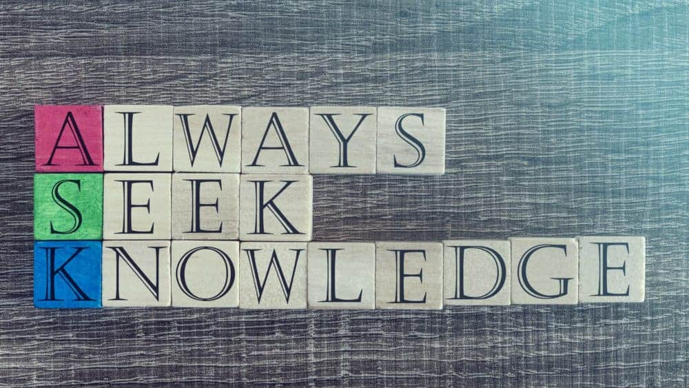 Knowledge concept with quote written on wooden blocks
