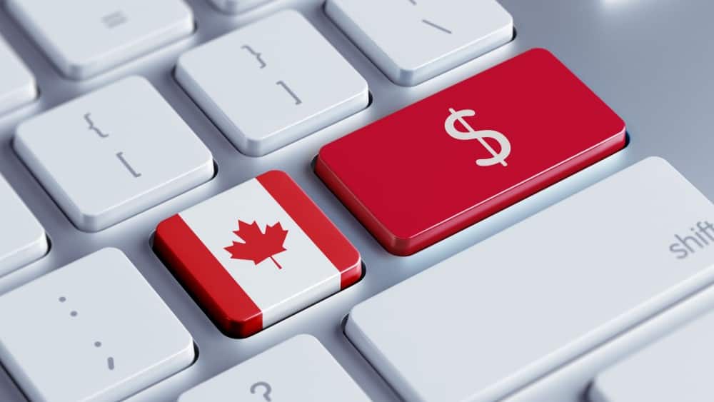 Dollar symbol and Canadian flag on keyboard